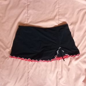 Super cute black, white, and coral pink side slit/cinch swim skirt by Profile